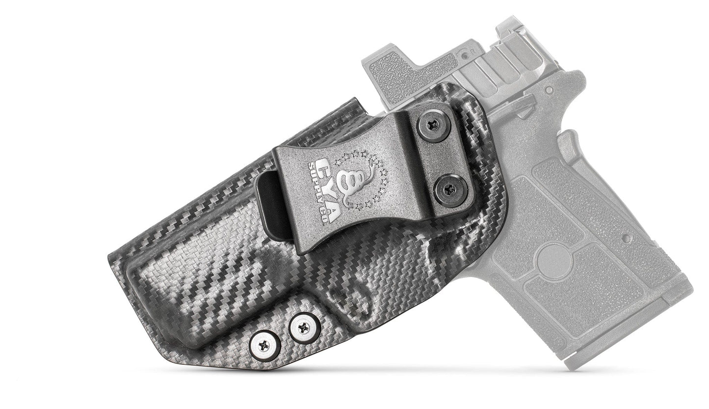 CYA base IWB Holster in carbon steel with a black clip on a black Smith & Wesson Equalizer handgun