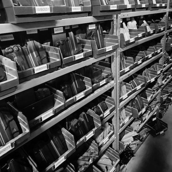 Five supply shelves filled with CYA holsters
