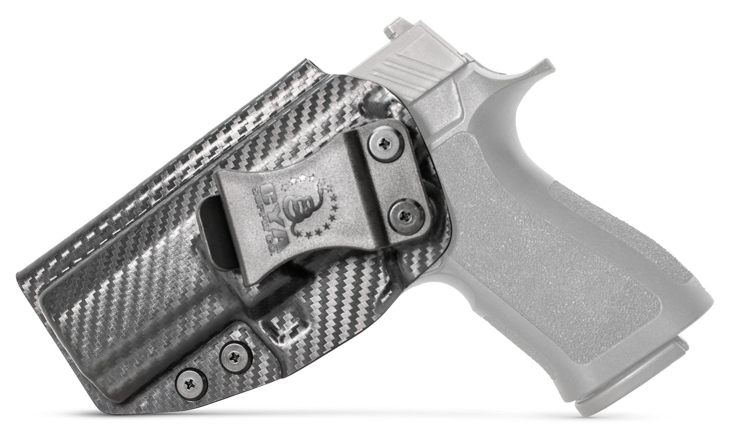 CYA XCarry Holster in carbon steel with a black clip on a black Sig Sauer P320 handgun