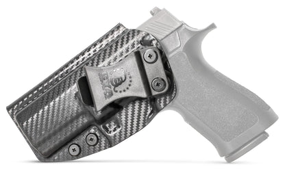 CYA XCarry Holster in carbon steel with a black clip on a black Sig Sauer P320 handgun