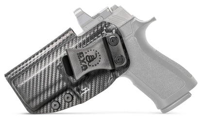 CYA XCarry Holster in carbon steel with a black clip on a black Sig Sauer P320